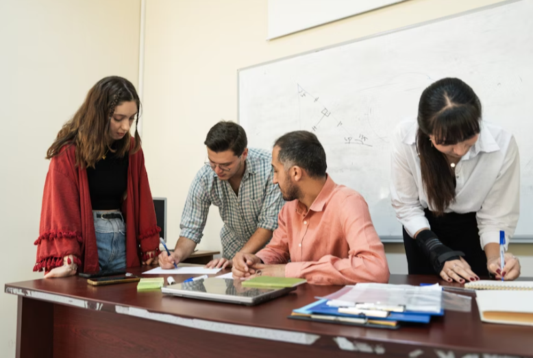 VR1 Enterprises team working with international educators